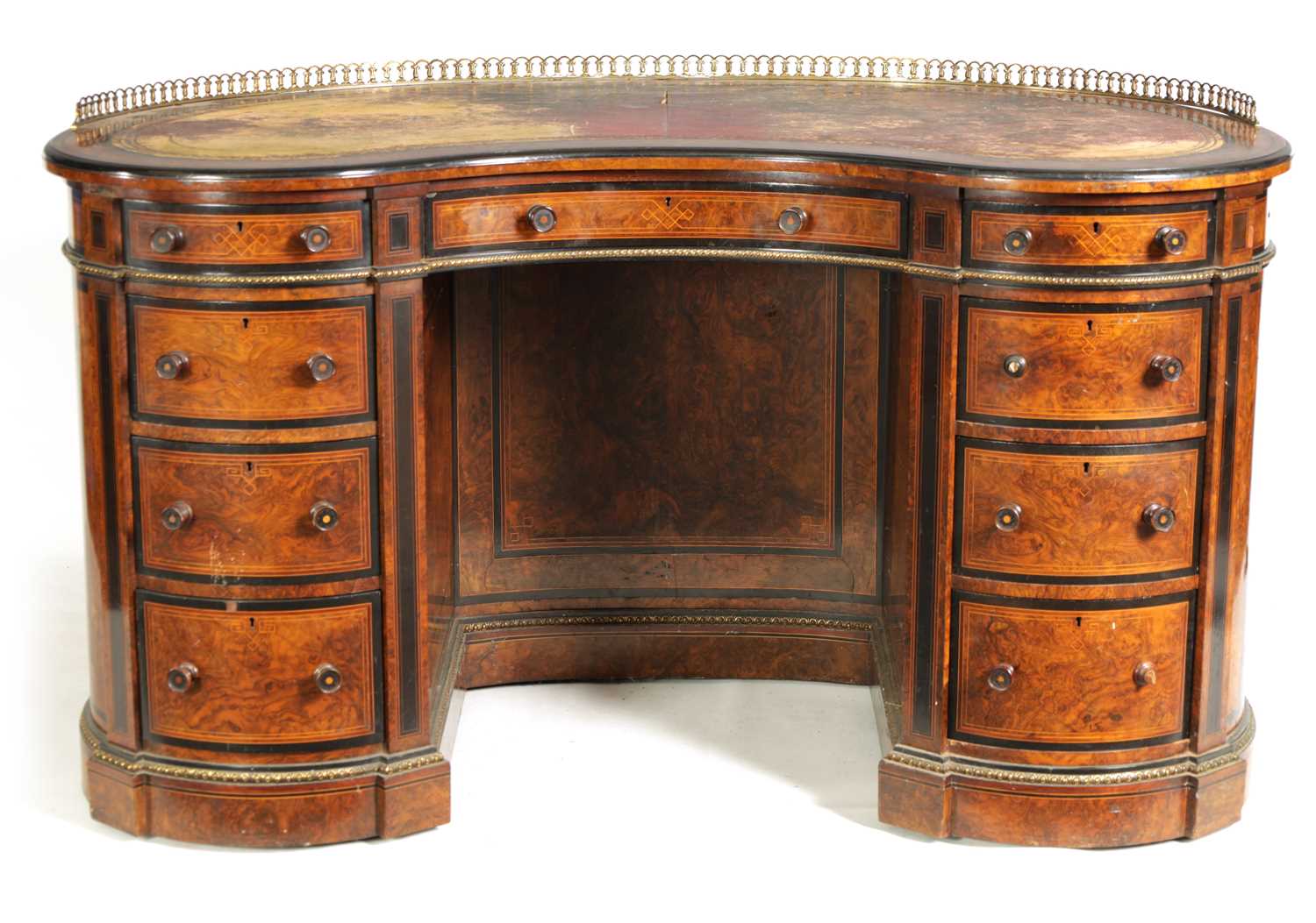 A FINE LATE 19TH CENTURY WALNUT AND EBONISED STRING INLAID KIDNEY SHAPED LIBRARY DESK WITH FITTED RE