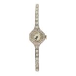 AN ART DECO PLATINUM AND DIAMOND SET LADIES COCKTAIL WATCH