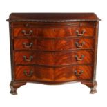 A LATE 19TH CENTURY MAHOGANY SERPENTINE CHEST OF DRAWERS
