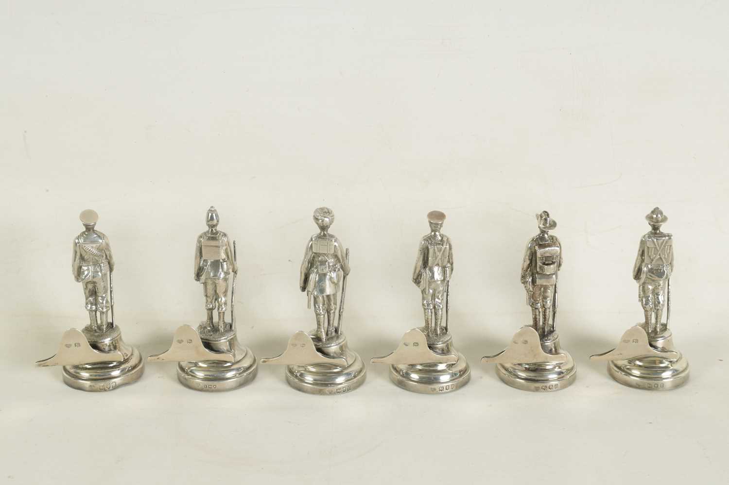 A LARGE AND RARE CASED COMPLETE SET OF SIX SILVER 'SOLDIERS OF THE EMPIRE' FIGURAL MENU HOLDERS - Image 8 of 12