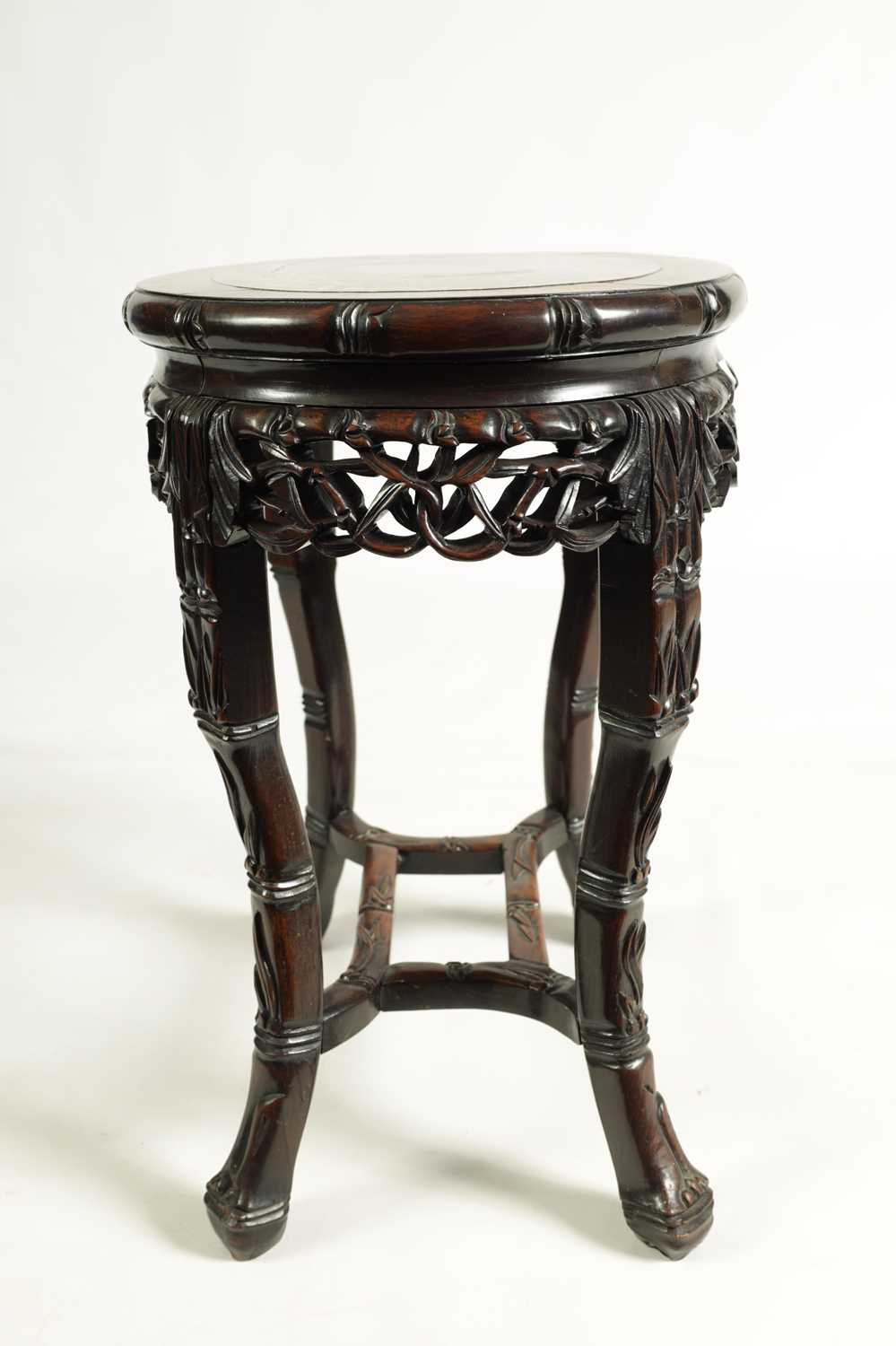A 19TH CENTURY OVAL CARVED HARDWOOD CHINESE TABLE - Image 7 of 8