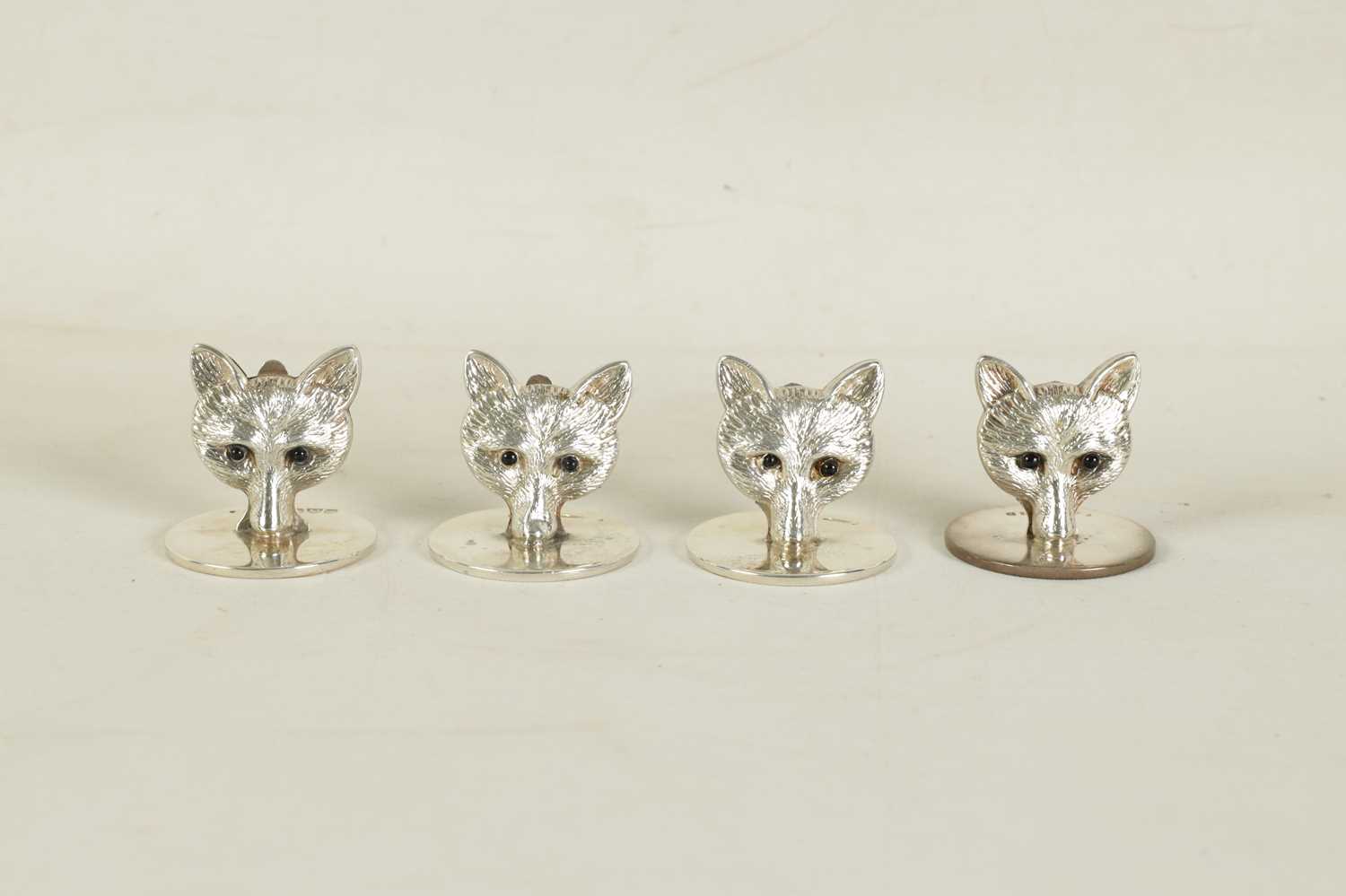 A CASED SET OF FOUR FOX HEAD SILVER MENU HOLDERS - Image 4 of 9