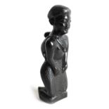 A 20TH CENTURY AFRICAN CARVED EBONY FIGURE