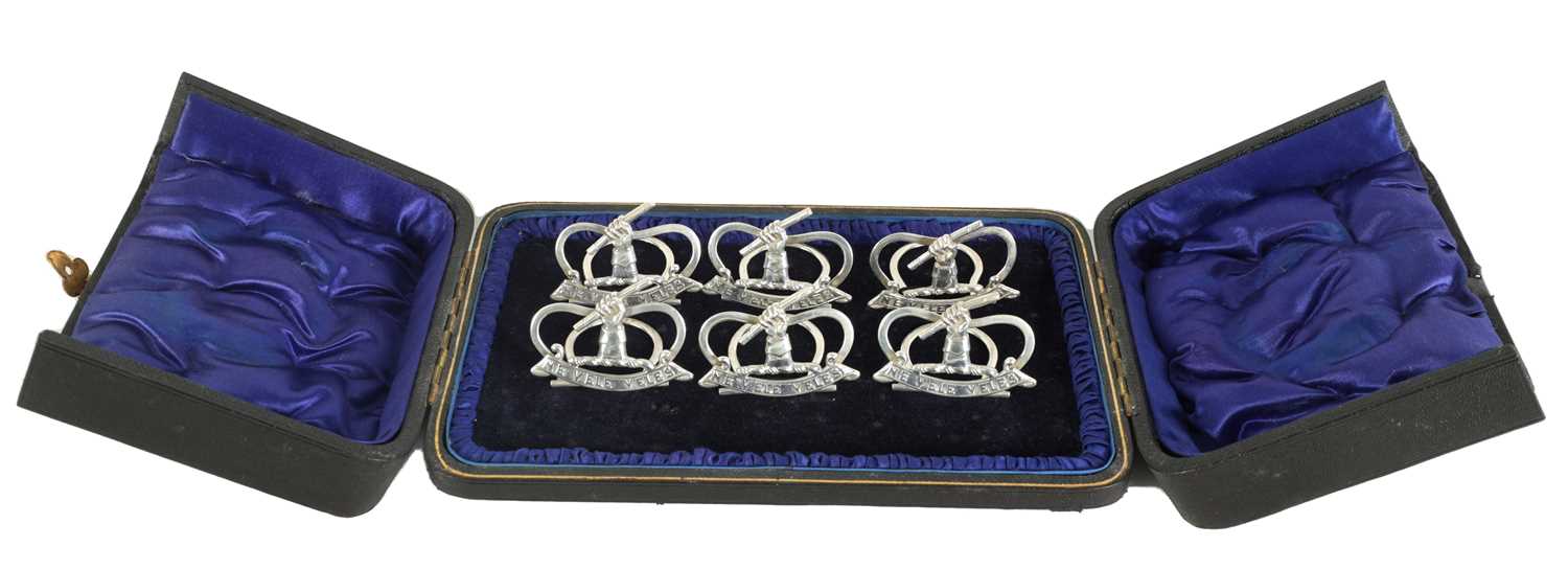 A CASED SET OF SIX LATE VICTORIAN SILVER MENU HOLDERS