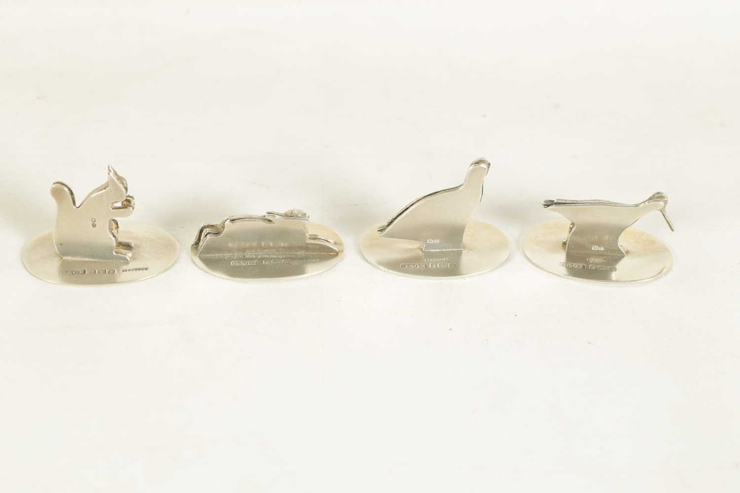 A CASED SET OF FOUR SILVER ANIMALIER MENU HOLDERS - Image 7 of 9