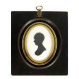 JOHN MIERS AN EARLY 19TH CENTURY OVAL SILHOUETTE BUST PORTRAIT ON PLASTER OF A YOUNG LADY