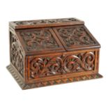 A LATE 19TH CENTURY CARVED ROSEWOOD STATIONERY BOX