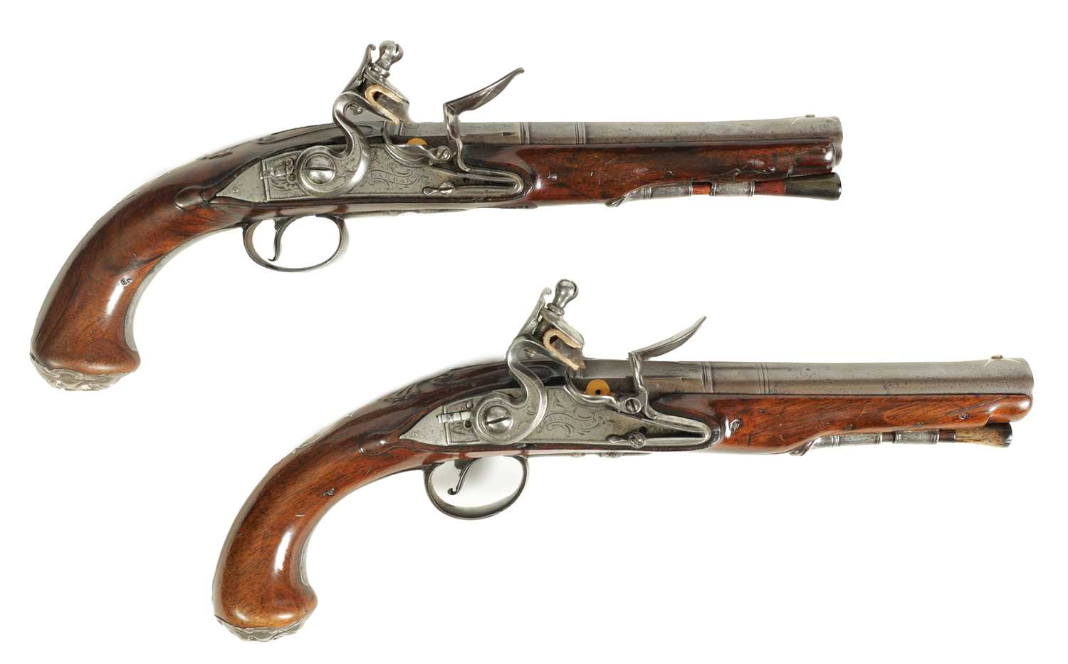 A PAIR OF 18TH CENTURY SILVER-MOUNTED ENGLISH FLINTLOCK PISTOLS BY BARBAR, LONDON.