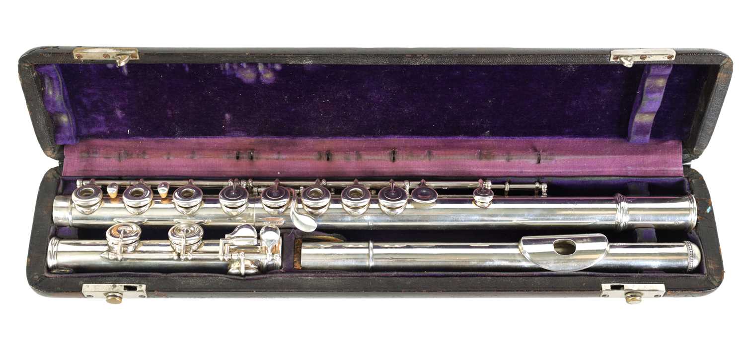 A MID 19TH CENTURY SOLID SILVER CONCERT FLUTE BY LOUIS LOT, PARIS. NO. 1056