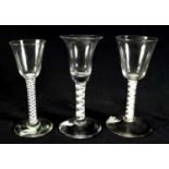 COLLECTION OF THREE 18TH CENTURY AND LATER OPAQUE TWIST WINE GLASSES