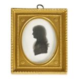 A LATE 18TH/EARLY 19TH CENTURY SILHOUETTE BUST PORTRAIT ON PLASTER