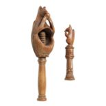 A 19TH CENTURY CARVED TREEN NUTCRACKER AND NEEDLE HOLDER