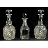 A PAIR OF LATE GEORGIAN CUT GLASS DECANTERS