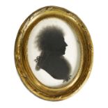 J THOMASON DUBLIN-A LATE 18TH/EARLY 19TH CENTURY OVAL SILHOUETTE BUST PORTRAIT ON PLASTER