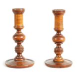 A PAIR OF 19TH-CENTURY SMALL FRUIT WOOD TREEN CANDLESTICKS