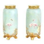 A PAIR OF EARLY 20TH CENTURY ROYAL WORCESTER CYLINDRICAL CABINET VASES PAINTED BY GEORGE B. JOHNSON