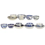 A COLLECTION OF 18TH CENTURY BLUE AND WHITE CAUGHLEY AND OTHER TEA BOWLS AND SUACERS