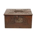 A 17TH-CENTURY CARVED OAK DEED BOX