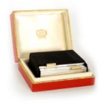 CARTIER, PARIS A MID 20TH CENTURY FRENCH SILVER AND GOLD MOUNTED LADIES POWDER COMPACT