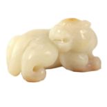 A CHINESE WHITE JADE SCULPTURE