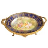 A LATE 19TH CENTURY SERVES STYLE OVAL ORMOLU MOUNTED CENTREPIECE