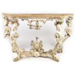 AN 18TH CENTURY ITALIAN PAINTED CARVED WOOD SERPENTINE SHAPED CONSOLE TABLE IN THE ROCOCO MANNER