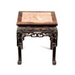 A 19TH CENTURY CHINESE HARDWOOD JARDINIERE STAND