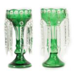A PAIR OF 19TH CENTURY GREEN AND CLEAR GLASS LUSTRES
