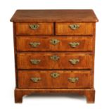 AN EARLY 18TH CENTURY FIGURED WALNUT CHEST OF DRAWERS OF SMALL SIZE