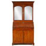 A WILLIAM AND MARY HERRING-BANDED BURR ELM BUREAU BOOKCASE