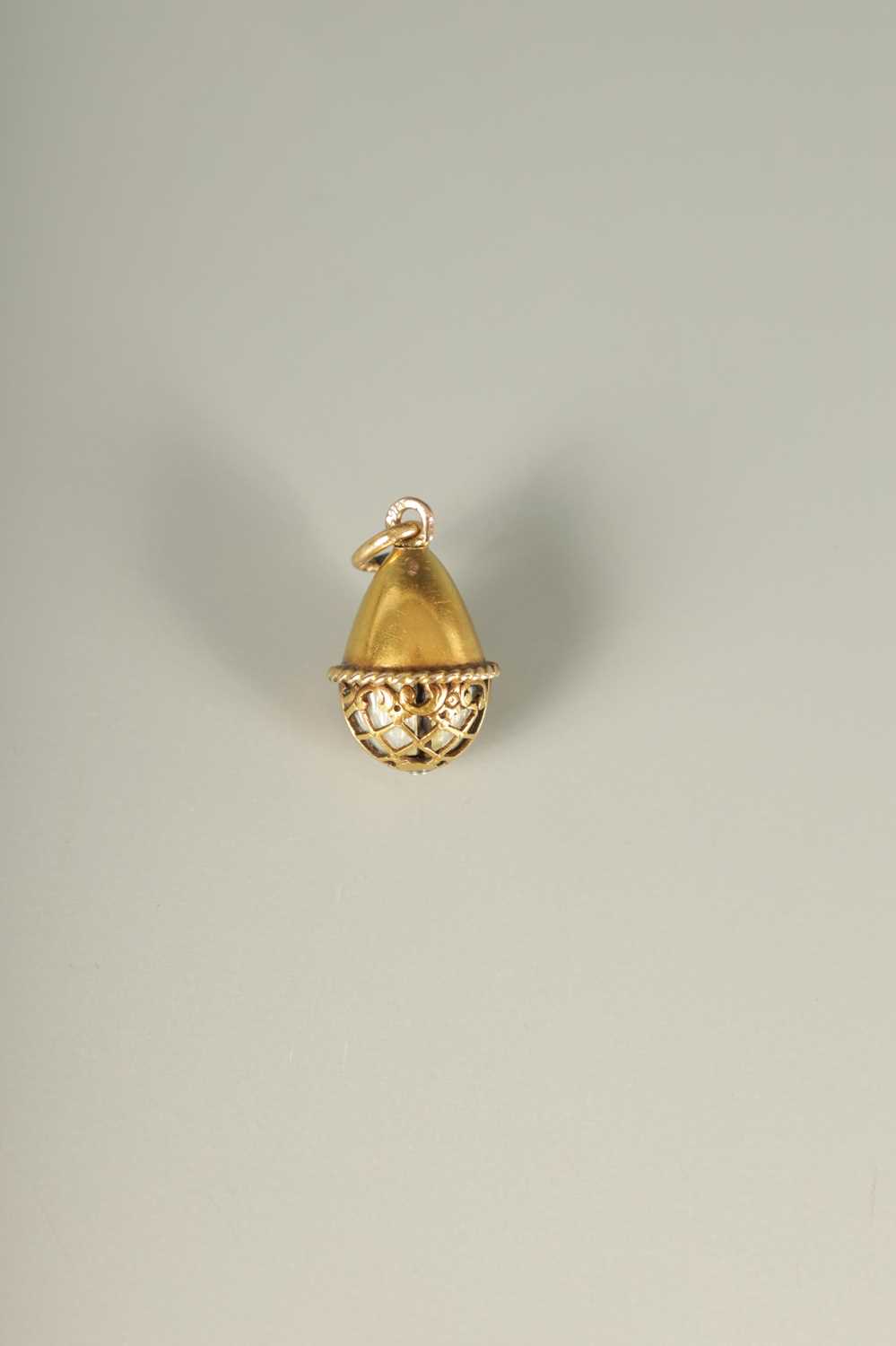 A LATE 19TH CENTURY FABERGE 14CT GOLD ENAMEL AND RUBY PENDANT EGG, WORKMASTER HENRIK WIGSTROM - Image 6 of 16