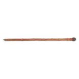 A 19TH CENTURY WEIGHTED ORIENTAL CARVED BAMBOO WALKING CANE