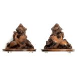 A GOOD PAIR OF 19TH CENTURY CARVED LINDEN WOOD BLACK FOREST WALL BRACKETS