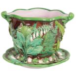 A 19TH CENTURY OVERSIZED MINTON MAJOLICA JARDINIERE ON STAND