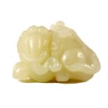 A CHINESE CARVED WHITE JADE SCULPTURE