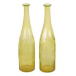 A PAIR OF BOHEMIAN PALE AMBER WINE BOTTLES