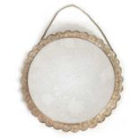 A LATE 19TH CENTURY FINELY EMBOSSED SILVER CIRCULAR HANGING MIRROR - POSSIBLY TURKISH