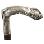 AN ART NOUVEAU SILVER MOUNTED WALKING CANE DEPICTING A RECLINING NUDE FEMALE TO THE HANDLE