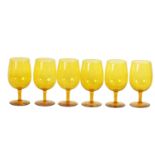 A SET OF SIX URANIUM AMBER GLASS WINE GOBLETS