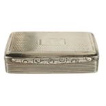 A WILLIAM IV SILVER AND SILVER GILT SNUFF BOX