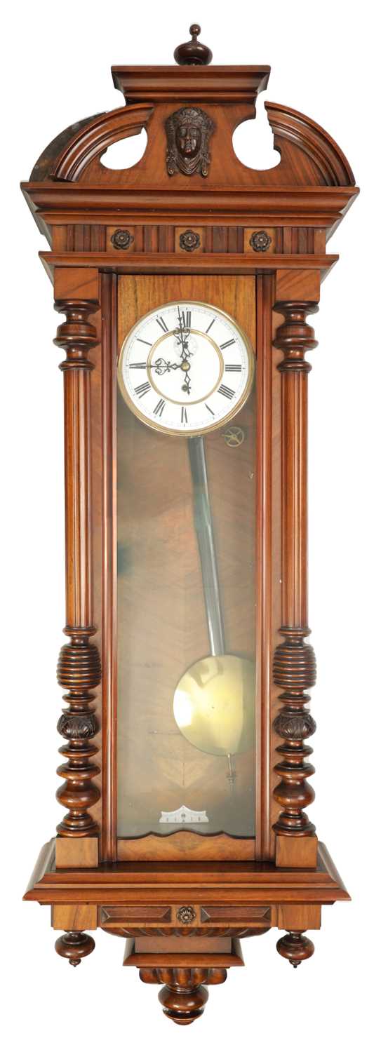 A LATE 19TH CENTURY WALNUT VIENNA STYLE WALL CLOCK