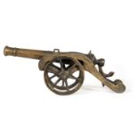 A 19TH CENTURY BRONZE STARTING CANNON