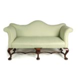 A 19TH CENTURY GEORGIAN STYLE CAMEL BACK THREE SEATER UPHOLSTERED SETTEE