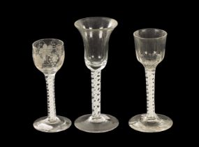 A COLLECTION OF THREE 18TH CENTURY AIR TWIST WINE GLASSES