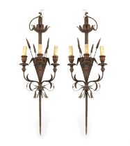 A DECORATIVE PAIR OF EALRY 20TH CENTURY FRENCH IRONWORK THREE BRANCH WALL LIGHTS