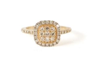 A 9CT GOLD DIAMOND CLUSTER RING