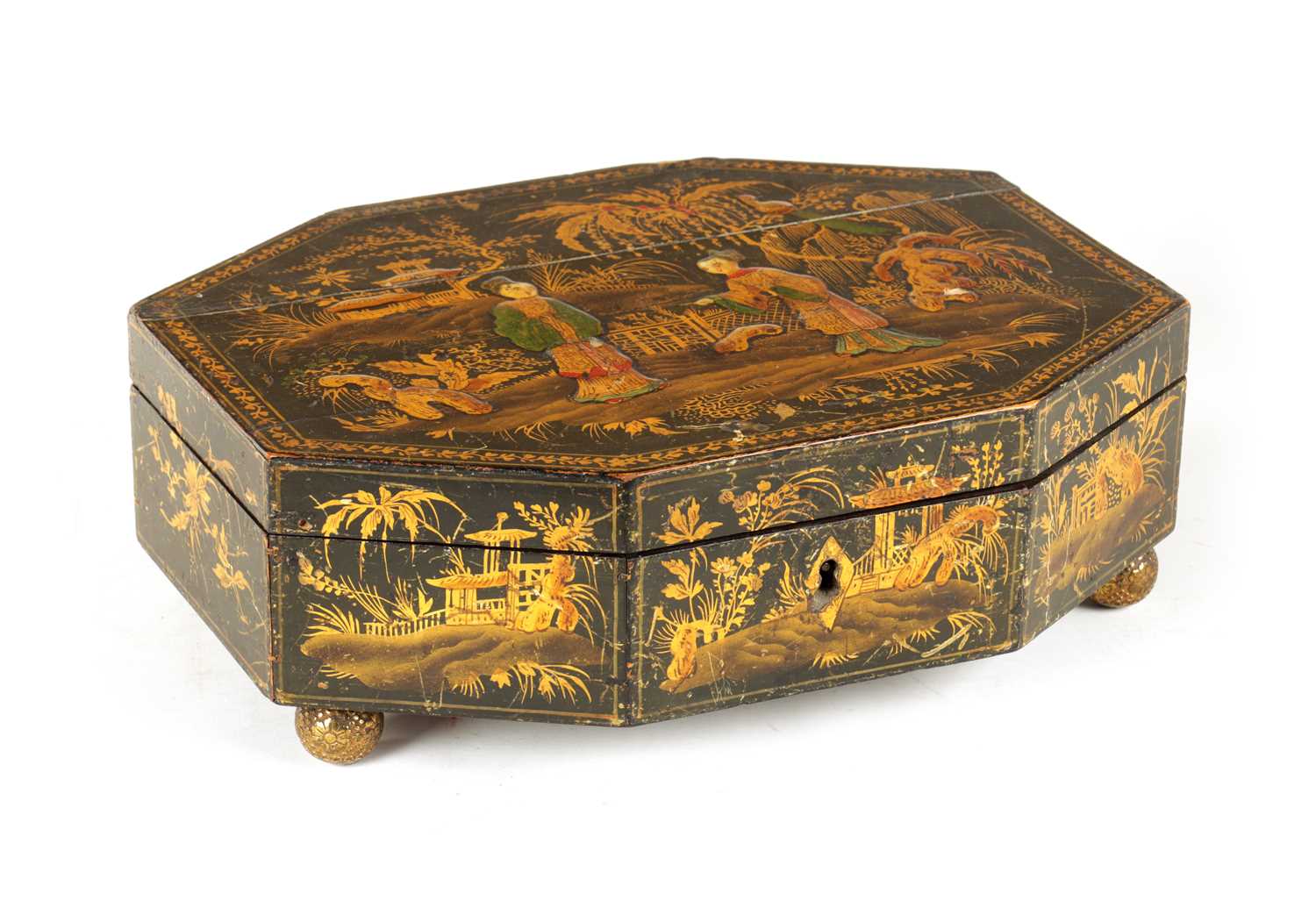 A REGENCY CHINOISERIE DECORATED LACQUERED SEWING BOX