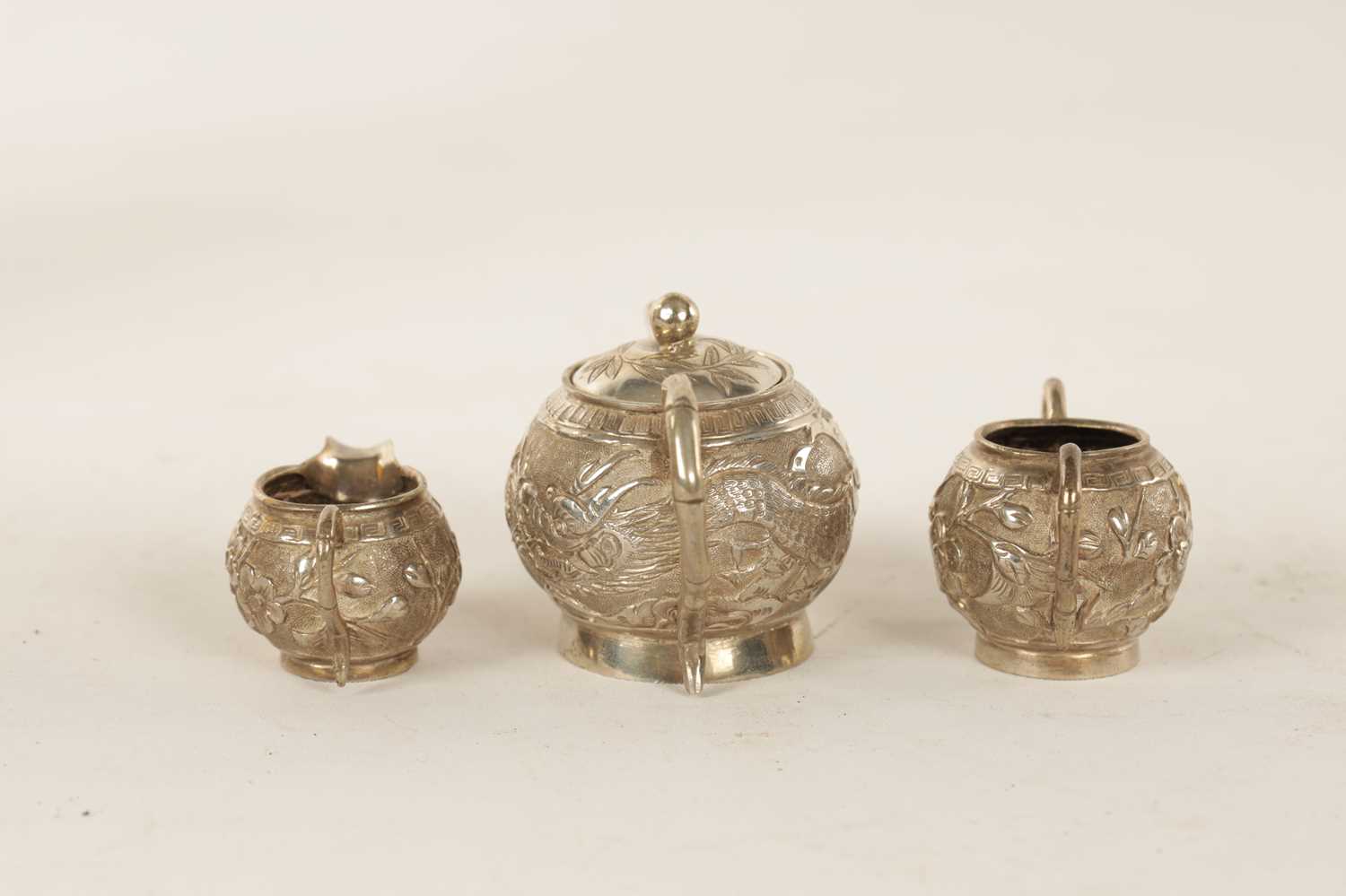 A LATE 19TH CENTURY CHINESE SILVER MINIATURE THREE PIECE TEA SERVICE - Image 2 of 6