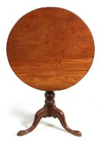 A GEORGE III TILT-TOP TABLE MADE OF UNUSUAL TIMBER-POSSIBLY TEAK