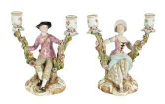 A PAIR OF MID/LATE 19TH CENTURY MEISSEN FIGURAL TWO-BRANCH CANDELABRA